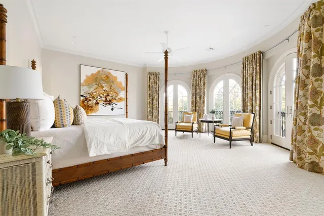 a spacious bathroom with a granite countertop sink mirror and a