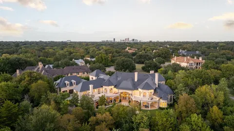 an aerial view of a house with a garden