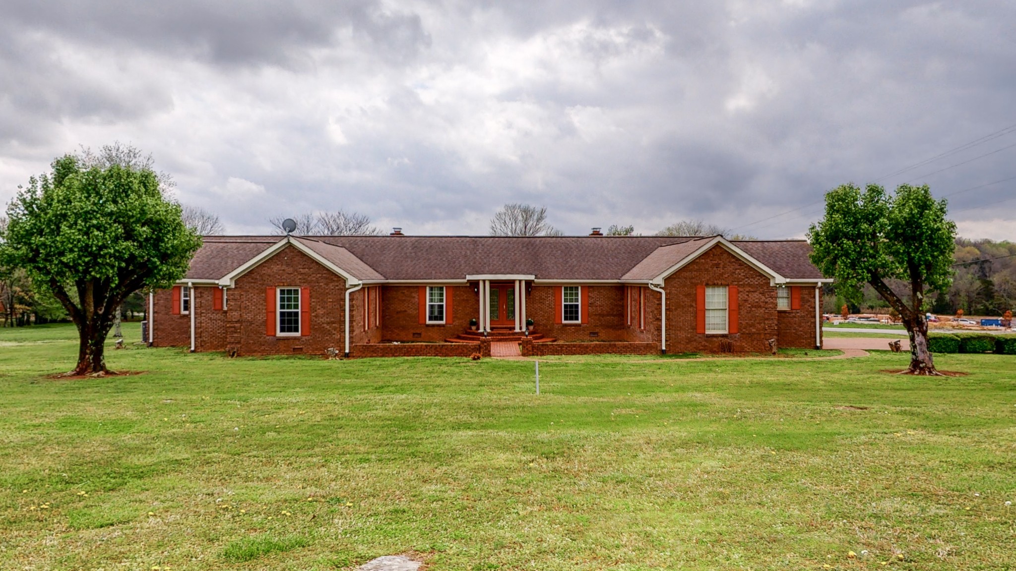 35 Palmer Road Lebanon, TN 37087 - Photo 1 of 23 a front view of a house with yard and green space