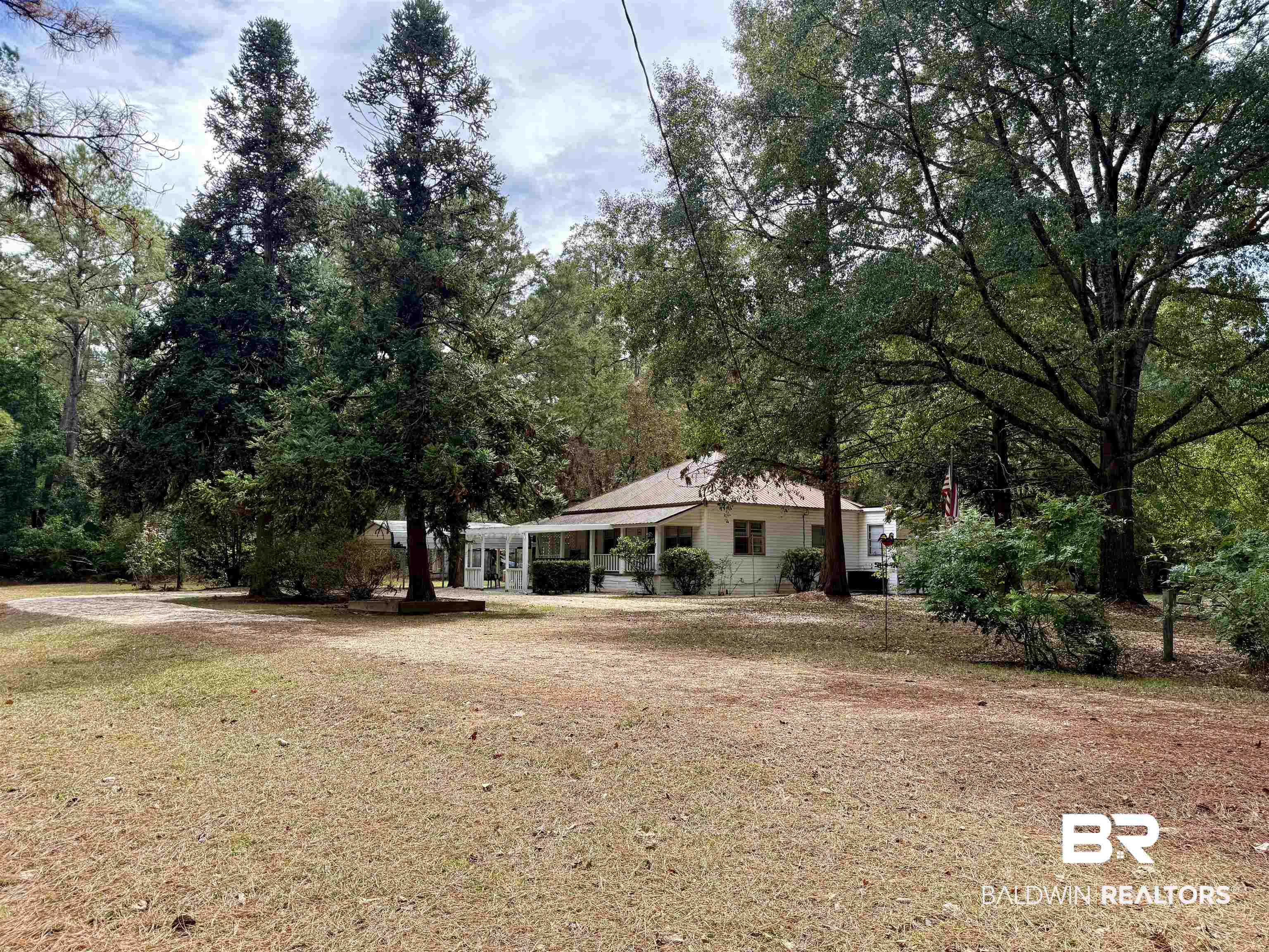 826 West Side Road Castleberry, AL 36432 - Photo 33 of 34 View of green lawn featuring a sunroom