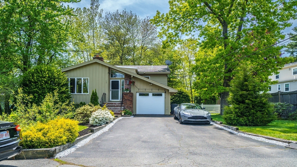 15 Carlin Road Waltham, MA 02451 - Photo 1 of 42 front view of a house with a small yard