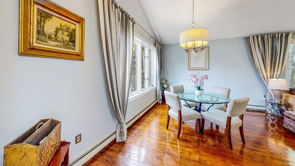 15 Carlin Road Waltham, MA 02451 - Photo 9 of 42 a view of a dining room with furniture and wooden floor