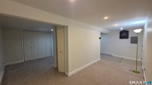 a view of hallway with livingroom