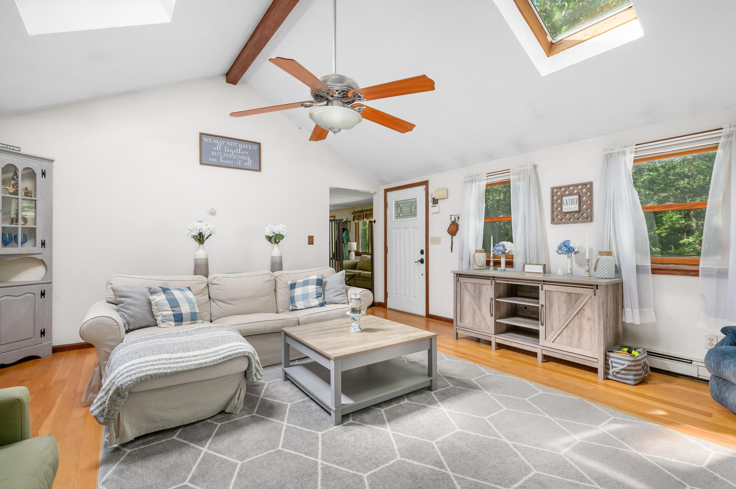 292 Jones Road Marstons Mills, MA 02648 - Photo 6 of 38 a living room with furniture and a wooden floor