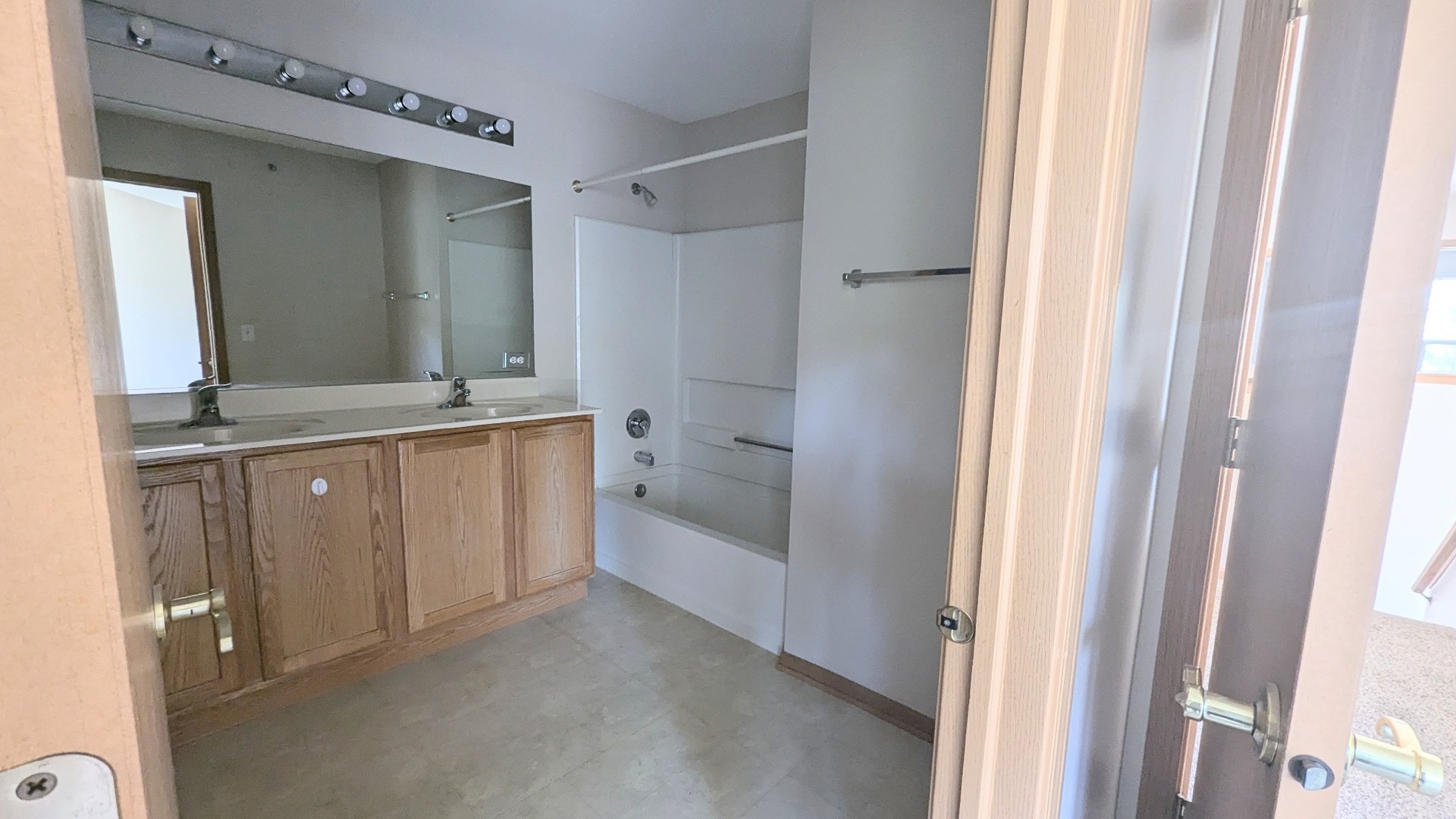 2075 Village View Drive Yorkville, IL 60560 - Photo 13 of 15 a bathroom with a granite countertop sink and a mirror