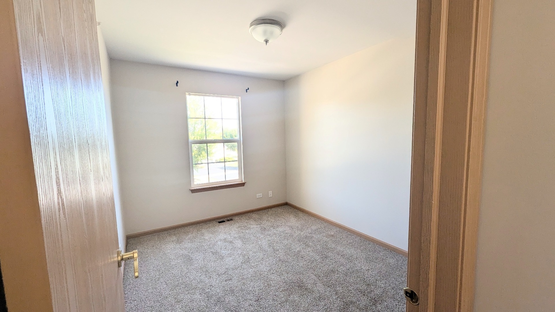 2075 Village View Drive Yorkville, IL 60560 - Photo 8 of 15 a view of an empty room with a window