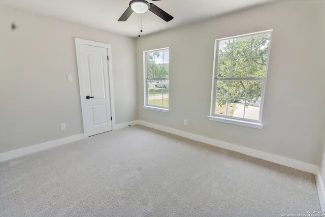 a bathroom with a sink toilet and vanity