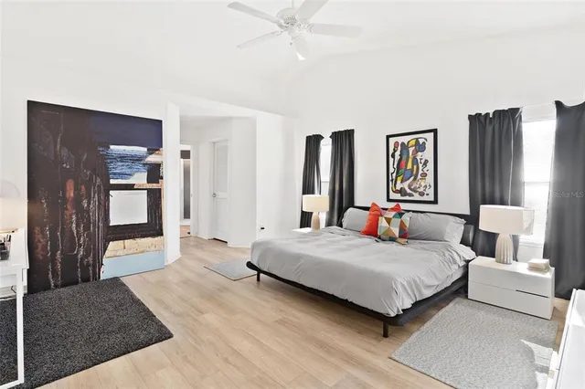 a bedroom with a bed and a cabinets