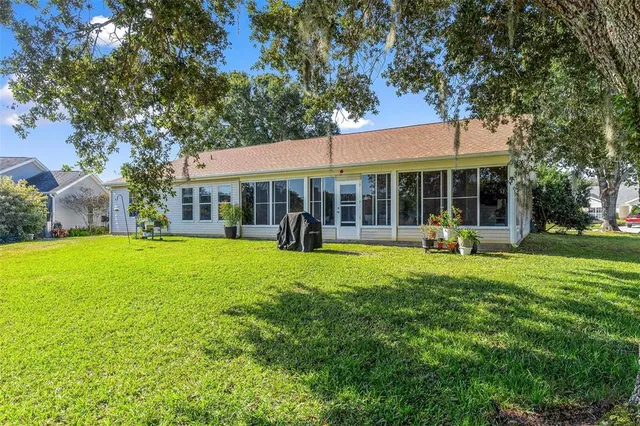 a view of outdoor space with deck and garden