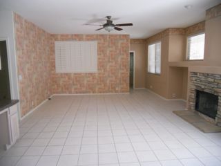 3931 East Agave Road Phoenix, AZ 85044 - Photo 4 of 13 Family room with Fireplace