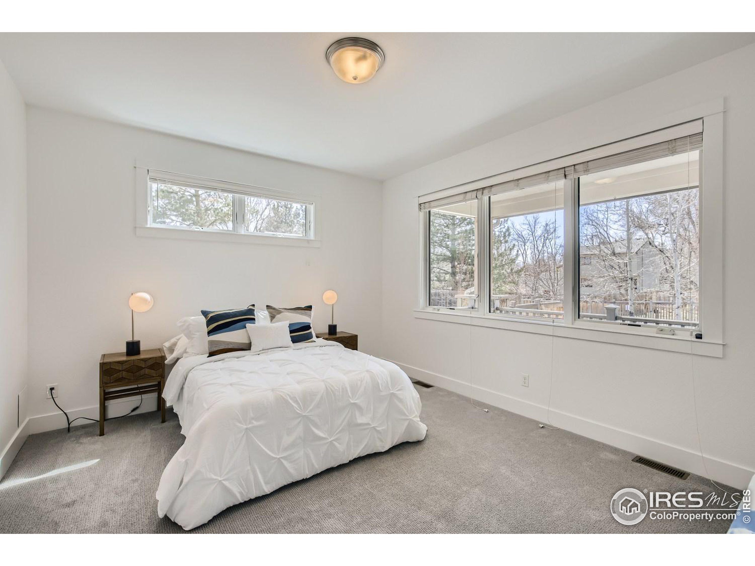 1525 Oak Avenue Boulder, CO 80304 - Photo 13 of 30 a bedroom with a bed and a window
