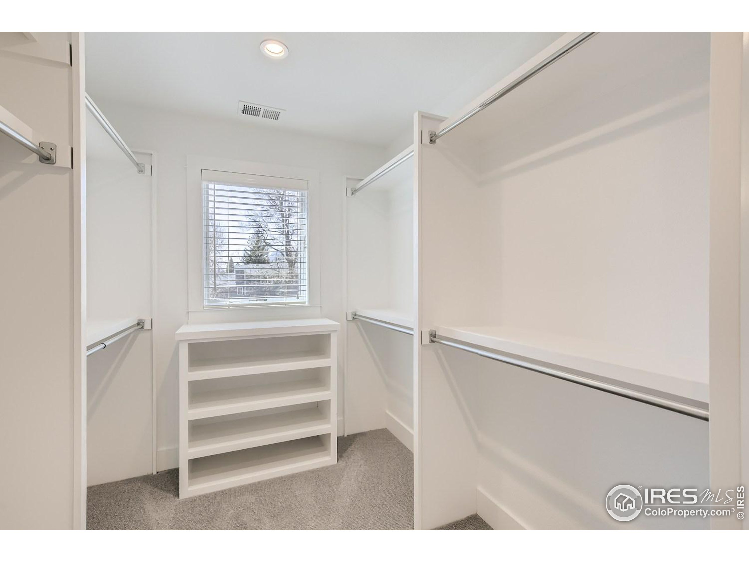 1525 Oak Avenue Boulder, CO 80304 - Photo 18 of 30 a view of closet area with empty racks