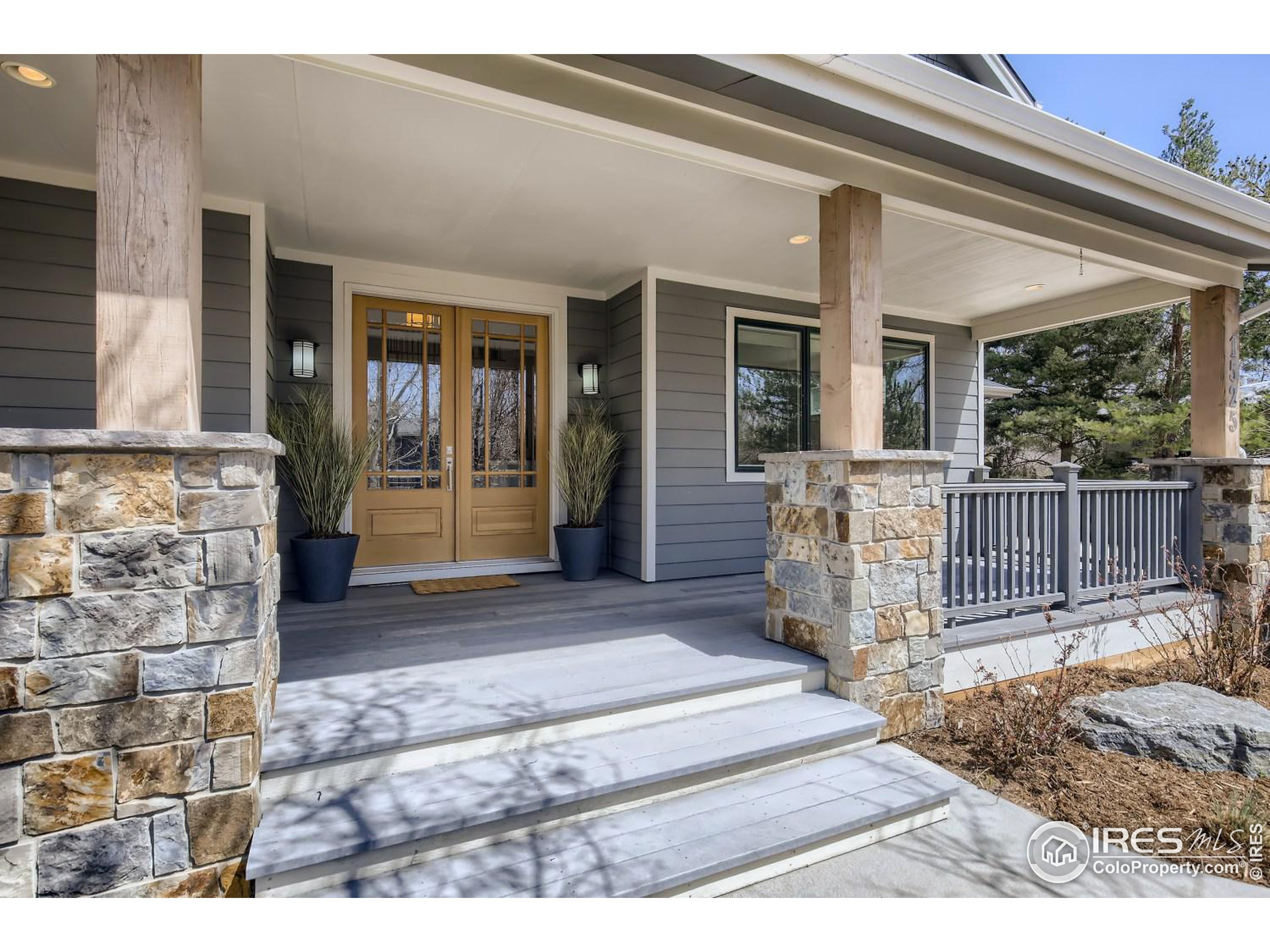 1525 Oak Avenue Boulder, CO 80304 - Photo 2 of 30 a front view of a house with a porch