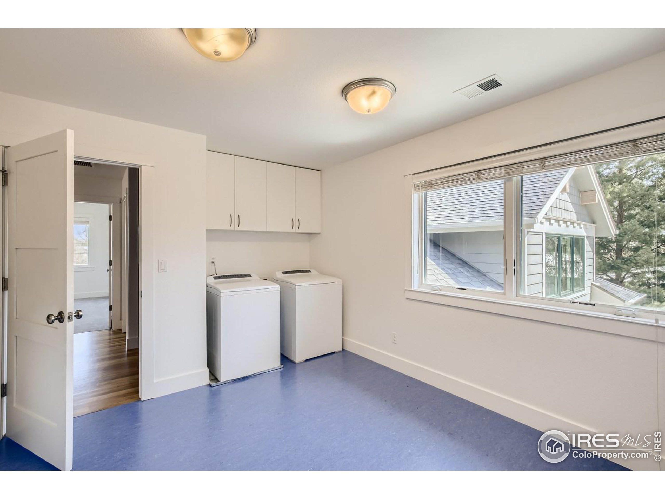 1525 Oak Avenue Boulder, CO 80304 - Photo 24 of 30 a view of a kitchen with wooden floor and a sink