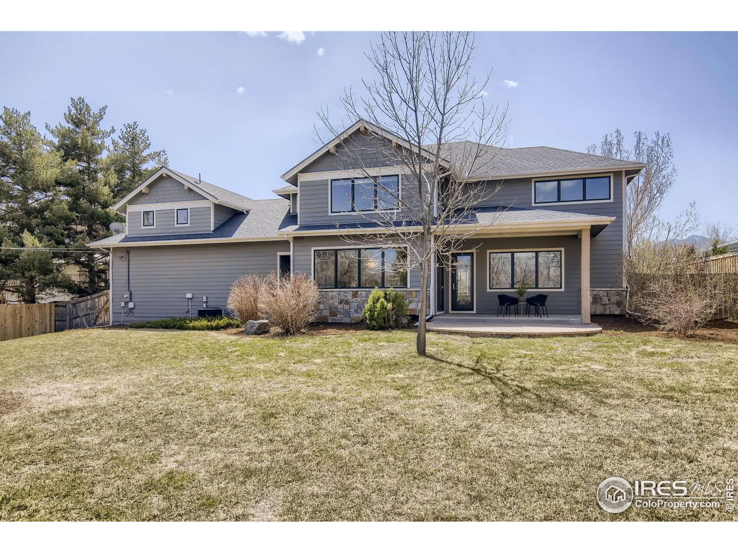 1525 Oak Avenue Boulder, CO 80304 - Photo 30 of 30 a front view of a house with a garden