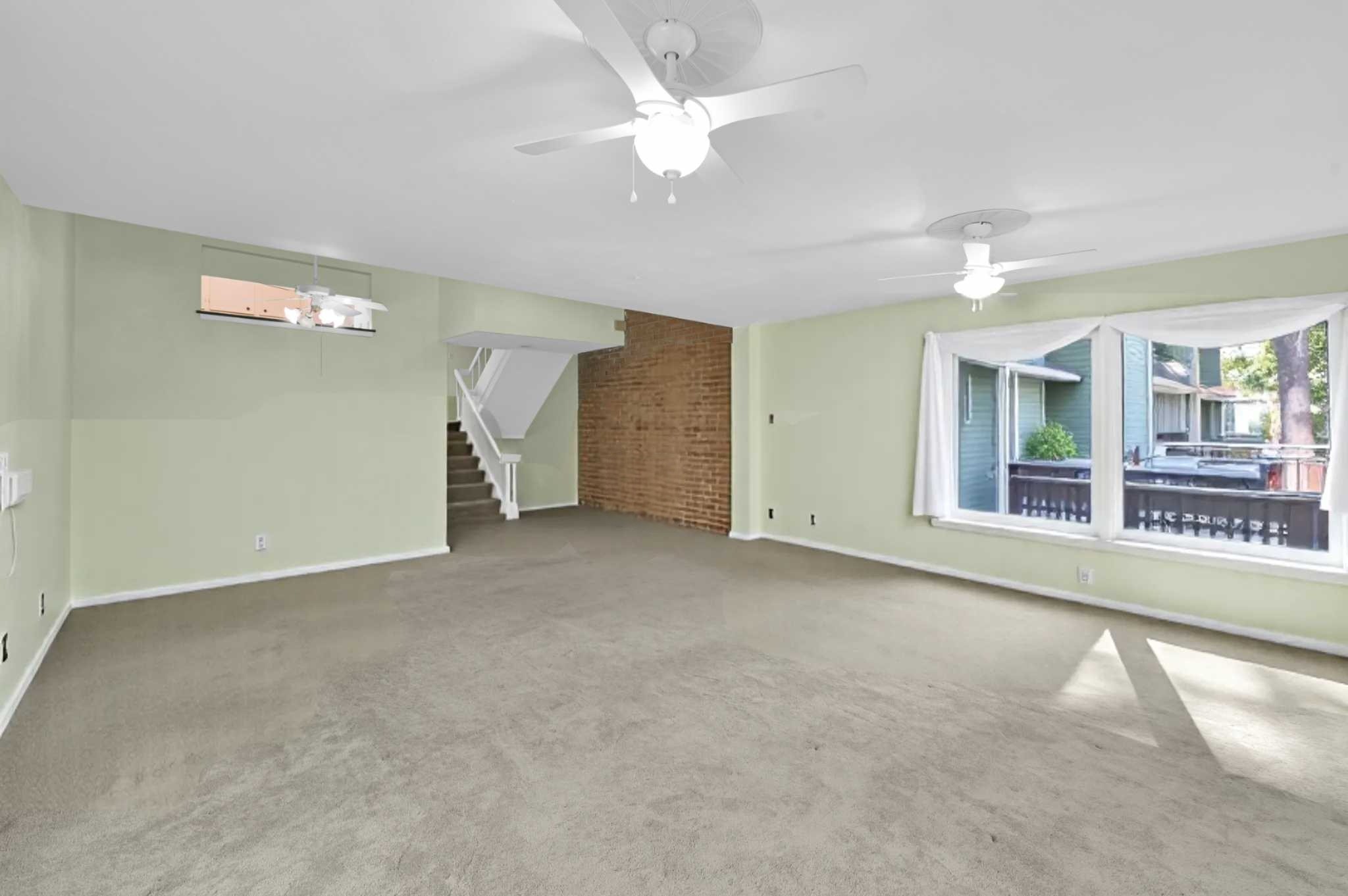 162 Villa Way Coldspring, TX 77331 - Photo 7 of 28 Extended Living/Dining roomwith panoramic windows