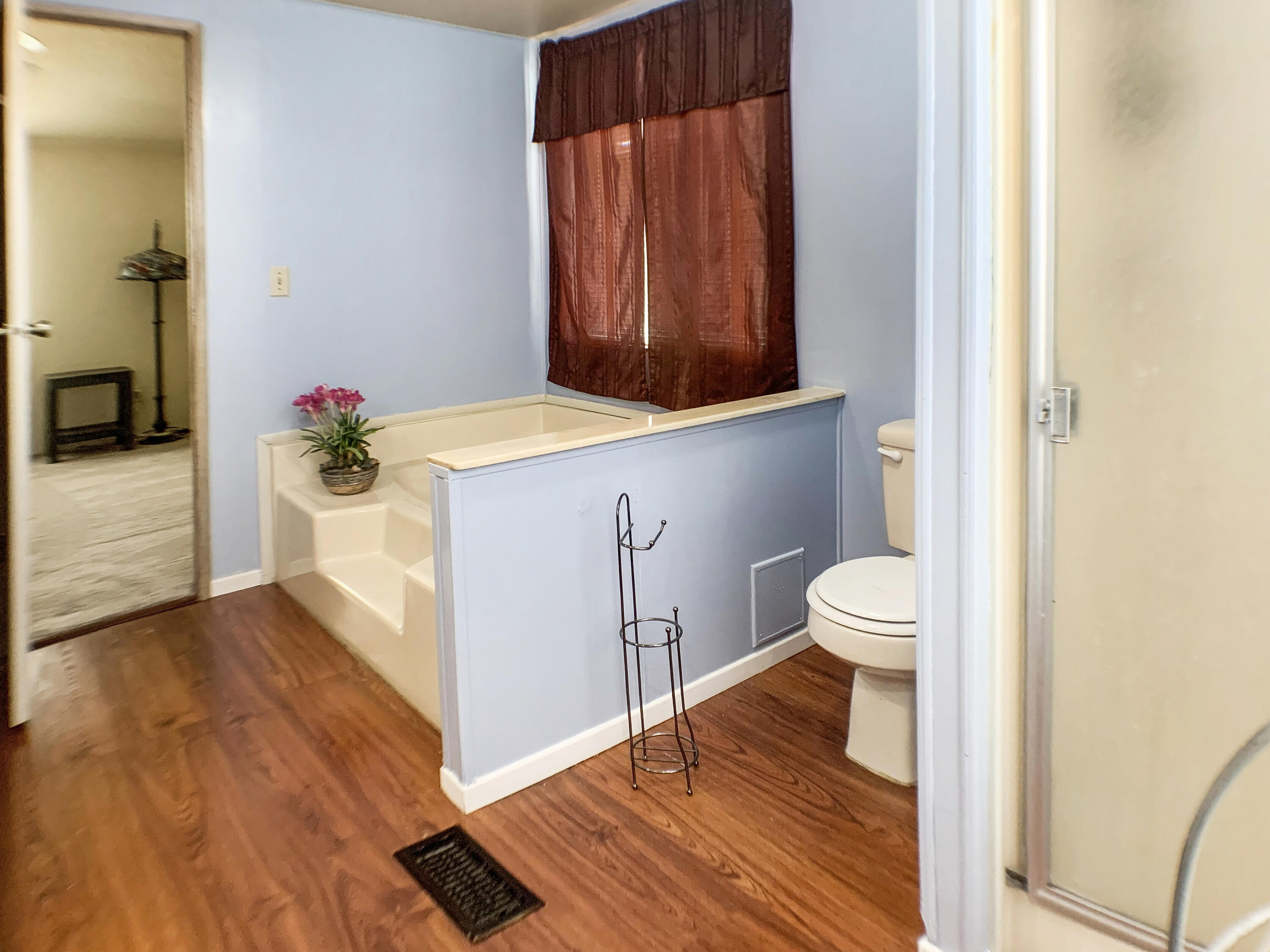 47685 Prado Way Indio, CA 92201 - Photo 15 of 26 a bathroom with a sink mirror vanity and toilet