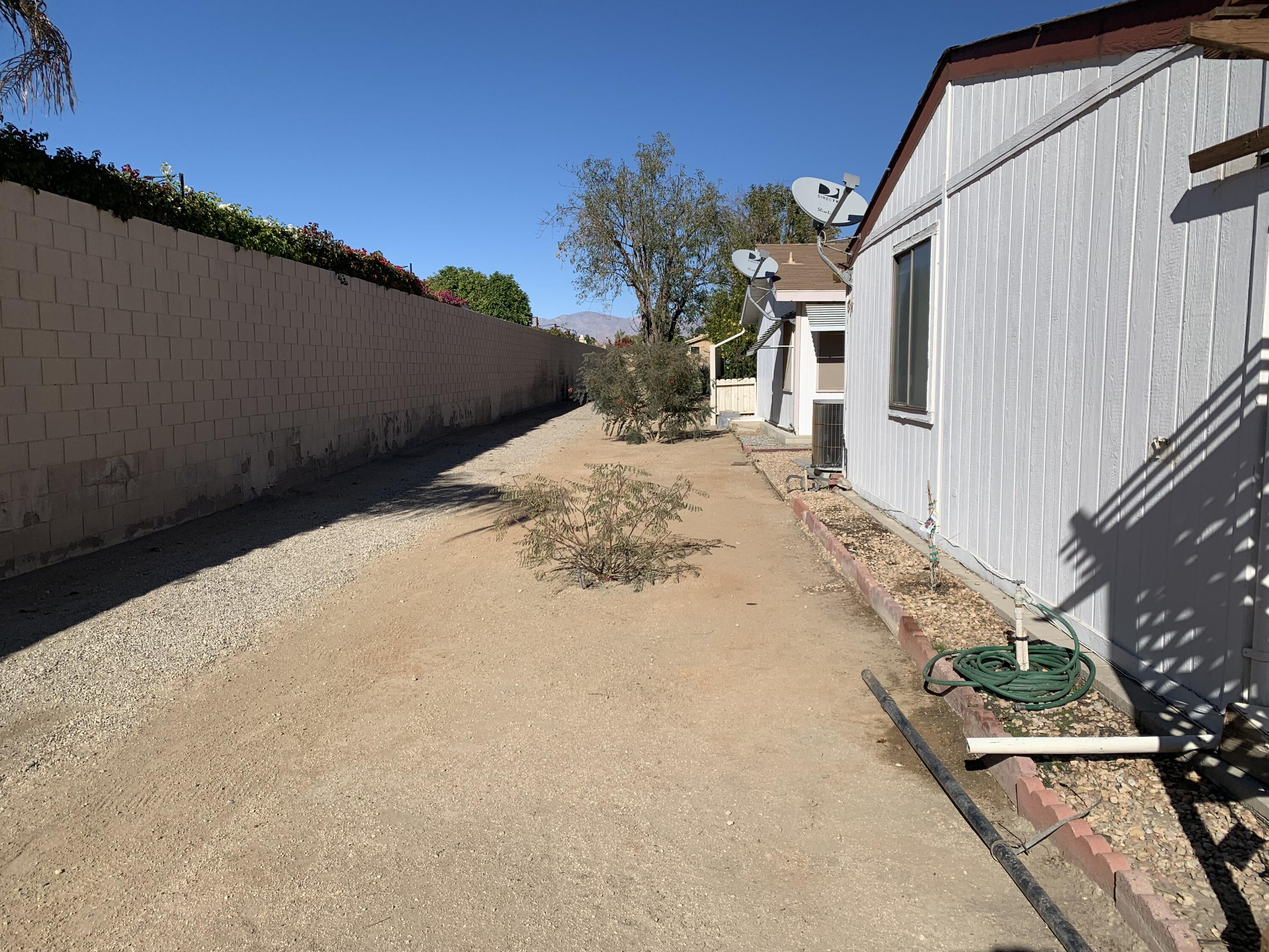 47685 Prado Way Indio, CA 92201 - Photo 26 of 26 a view of a backyard of the house