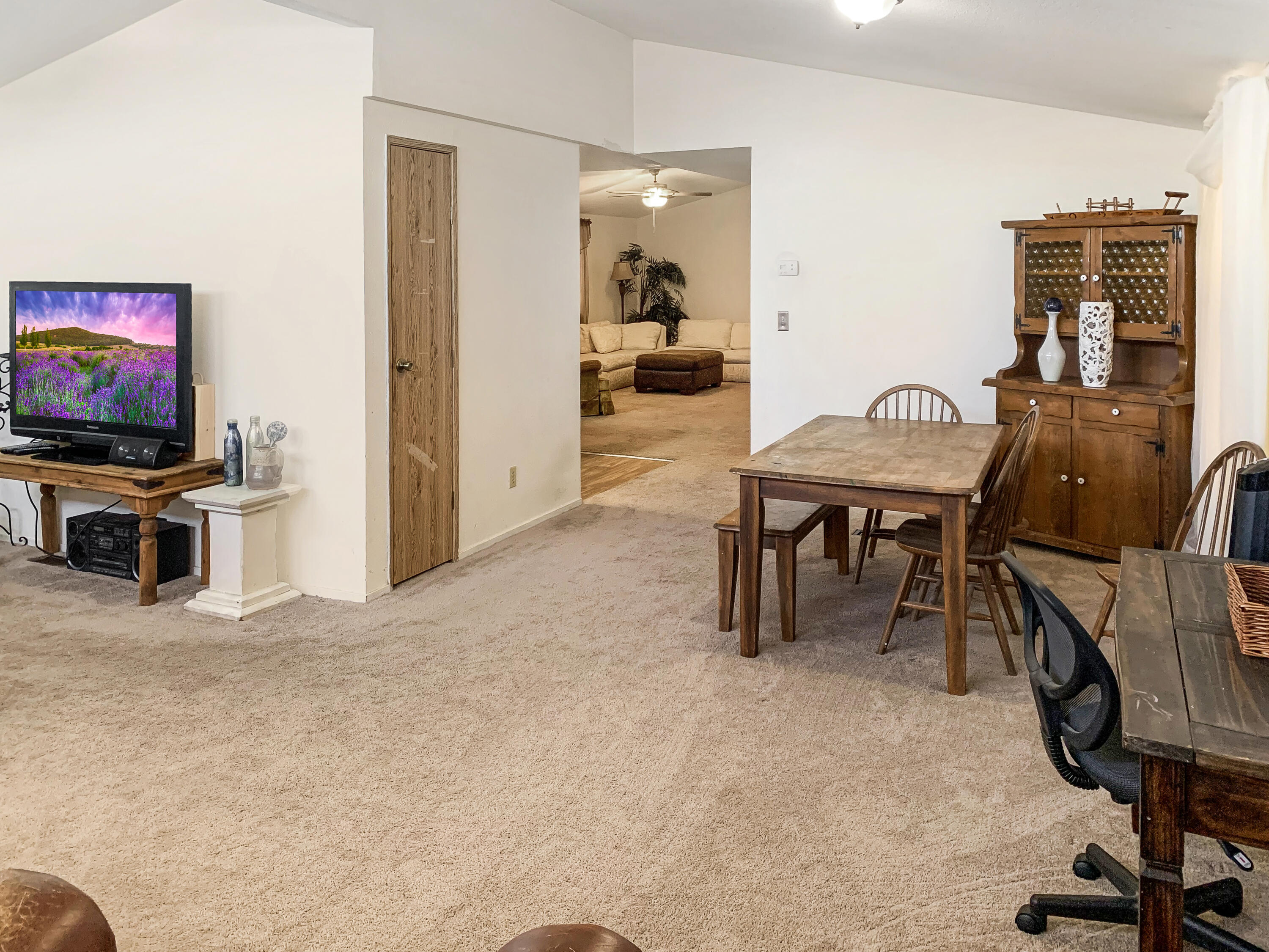 47685 Prado Way Indio, CA 92201 - Photo 6 of 26 a view of a livingroom with furniture and a flat screen tv