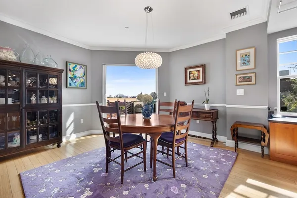 a view of a dining room with furniture