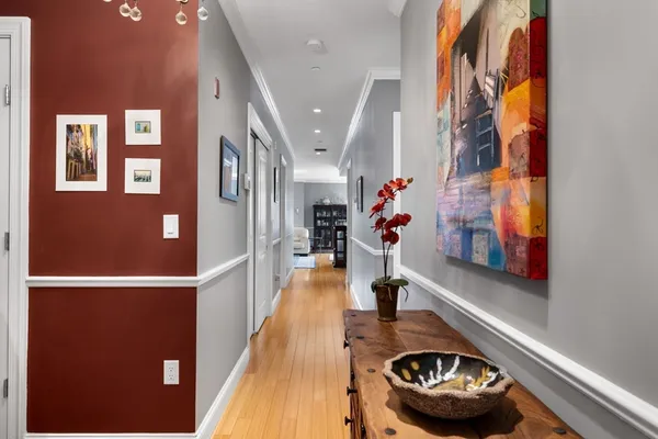 a picture of a living room with a rug and a floor