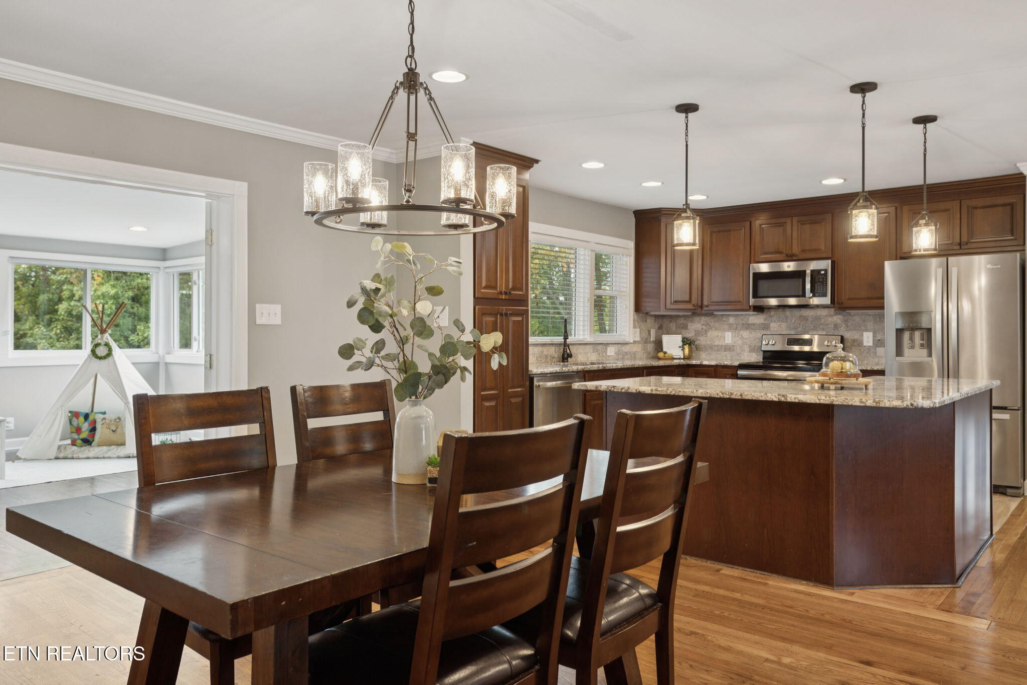 3847 Wilani Road Knoxville, TN 37919 - Photo 9 of 56 Dining Looking into Sunroom and Kitchen