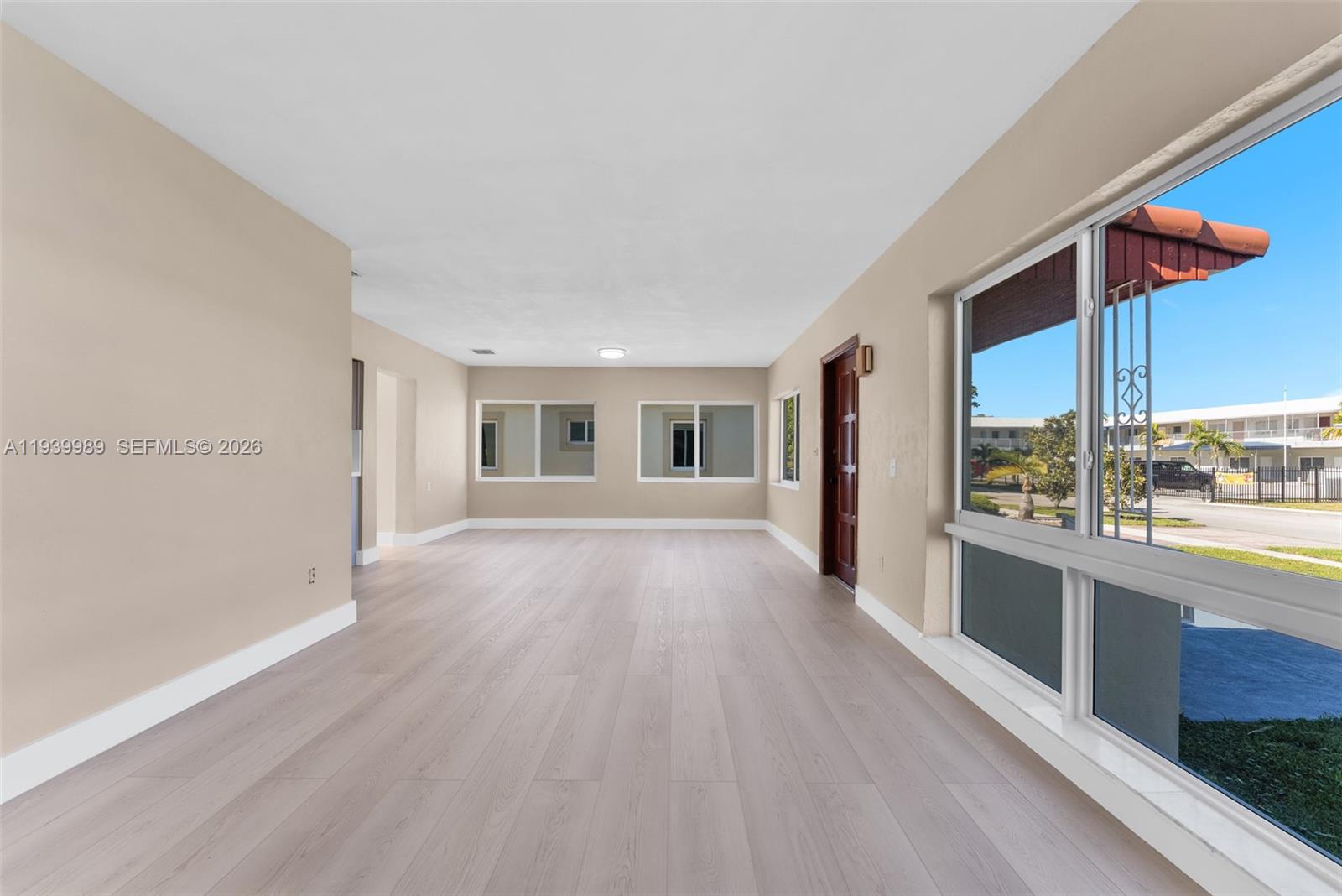 40 West 58th Street Hialeah, FL 33012 - Photo 12 of 25 a view of a living room with a large window