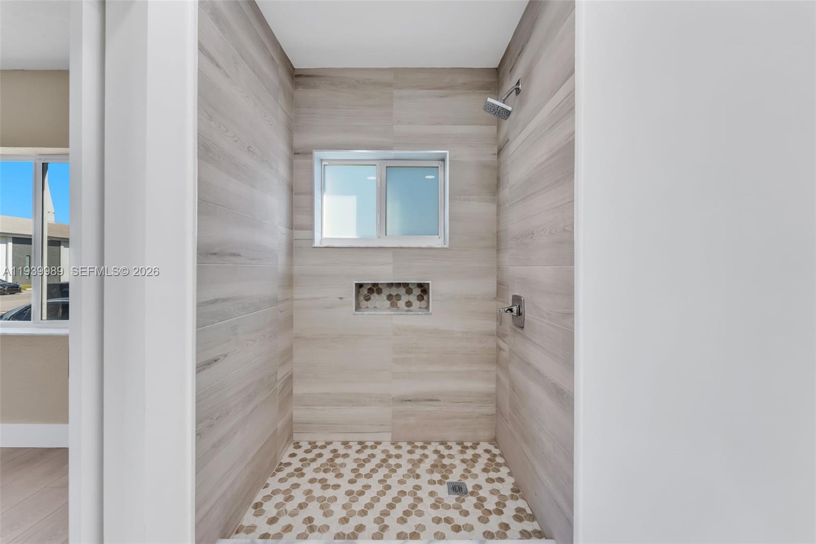 40 West 58th Street Hialeah, FL 33012 - Photo 16 of 25 a bathroom with a shower