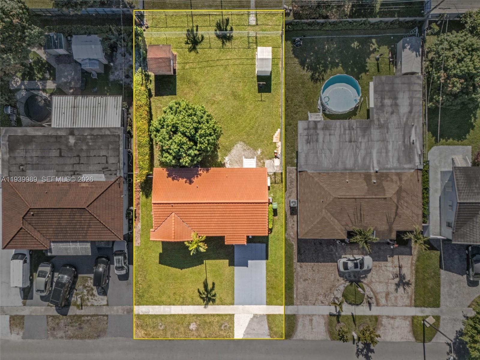 40 West 58th Street Hialeah, FL 33012 - Photo 24 of 25 an aerial view of a residential houses with outdoor space