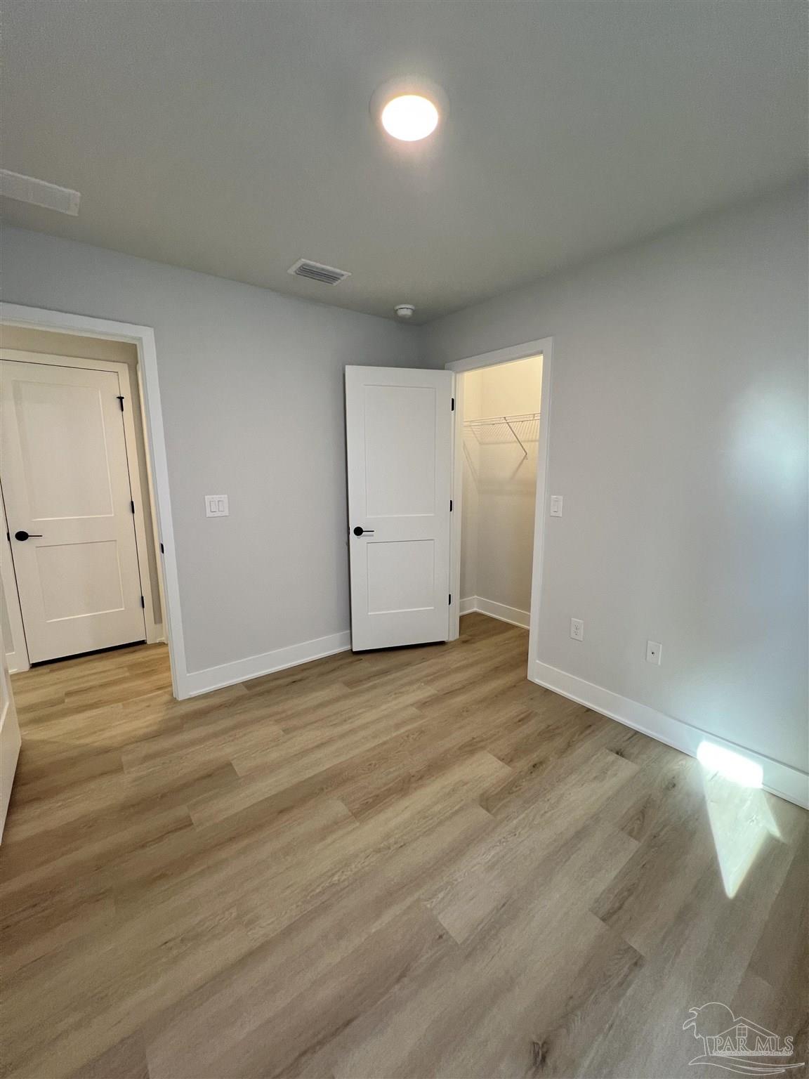 3327 Bliss Lane, Unit 12E Cantonment, FL 32533 - Photo 6 of 15 a view of an empty room