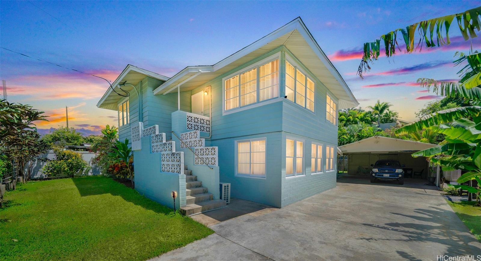 1237 Hele Street Kailua, HI 96734 - Photo 1 of 1 a front view of a house with a garden and plants
