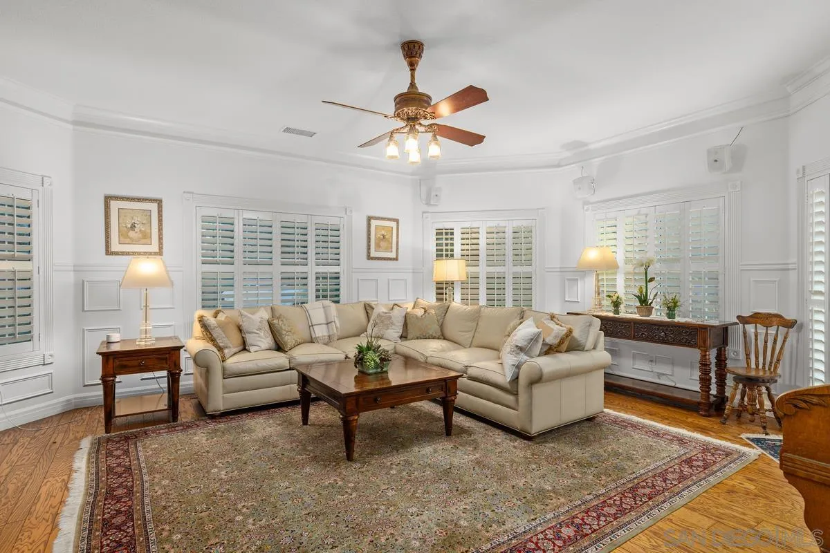 1642 Kings Way Vista, CA 92084 - Photo 15 of 41 a living room with furniture and a large window