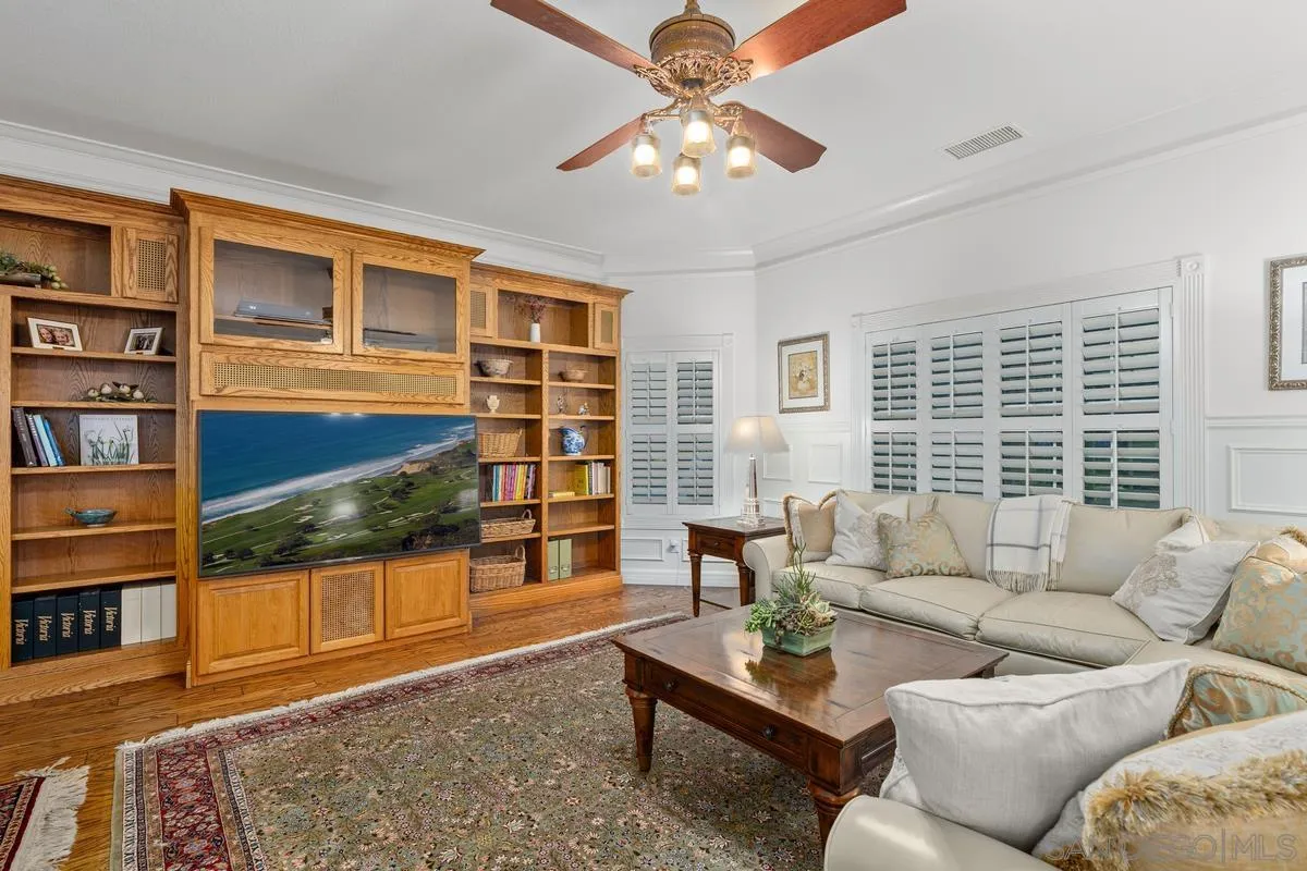 1642 Kings Way Vista, CA 92084 - Photo 16 of 41 a living room with furniture window and wooden floor