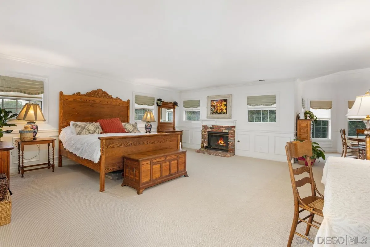 1642 Kings Way Vista, CA 92084 - Photo 20 of 41 a bedroom with furniture and a couch