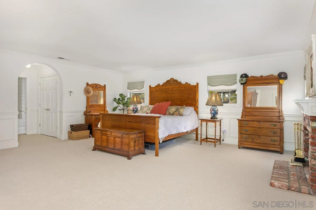 1642 Kings Way Vista, CA 92084 - Photo 23 of 41 a bedroom with furniture and window