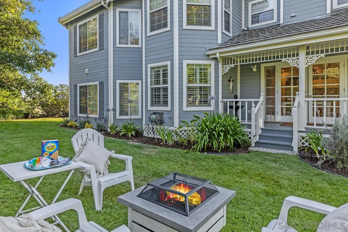 1642 Kings Way Vista, CA 92084 - Photo 36 of 41 front view of a house with a yard table and chairs