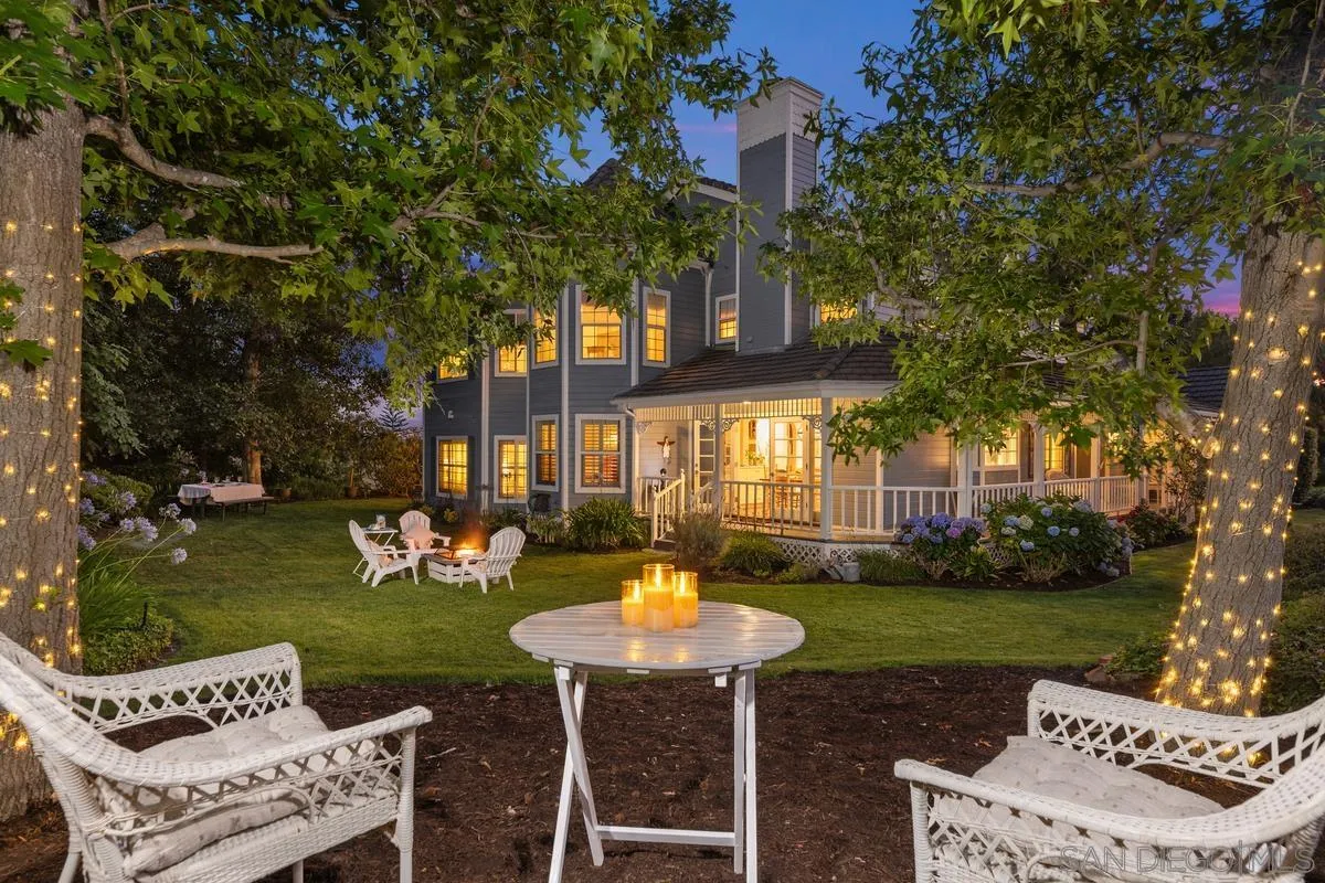 1642 Kings Way Vista, CA 92084 - Photo 37 of 41 a view of a table and chairs in backyard of the house