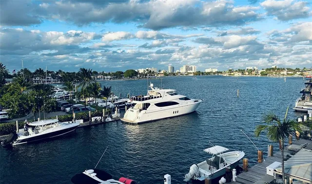 a front view of a house with garden and porch