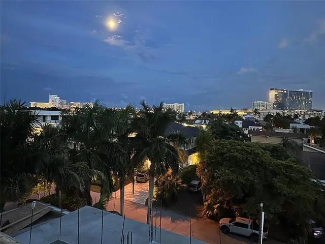 a view of house with swimming pool and outdoor space
