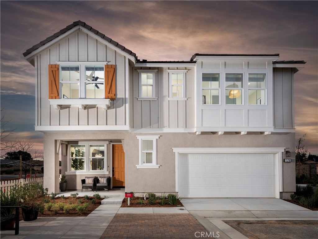 7176 Squall Drive Riverside, CA 92503 - Photo 7 of 15 a front view of a house with yard