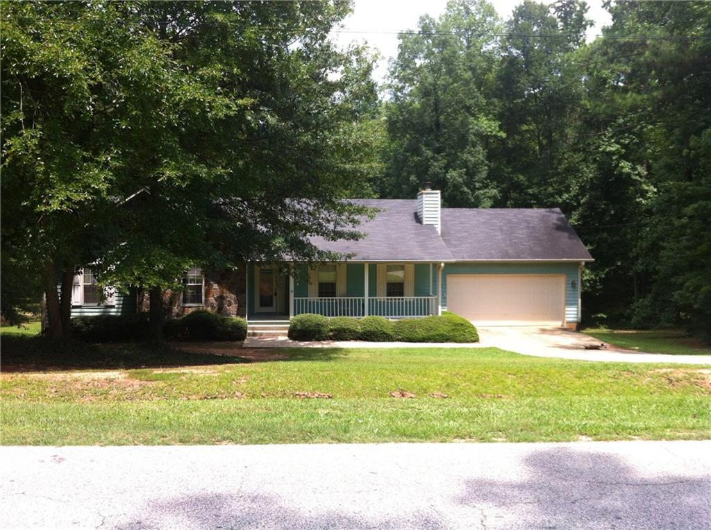 179 Davis Road Stockbridge, GA 30281 - Photo 1 of 1 a front view of a house with garden
