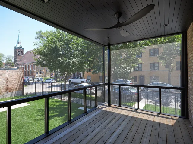 a dining room with furniture a window and kitchen view