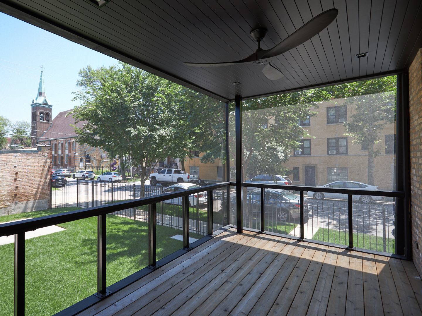 2039 North Humboldt Boulevard Chicago, IL 60647 - Photo 15 of 49 a view of a balcony with wooden floor