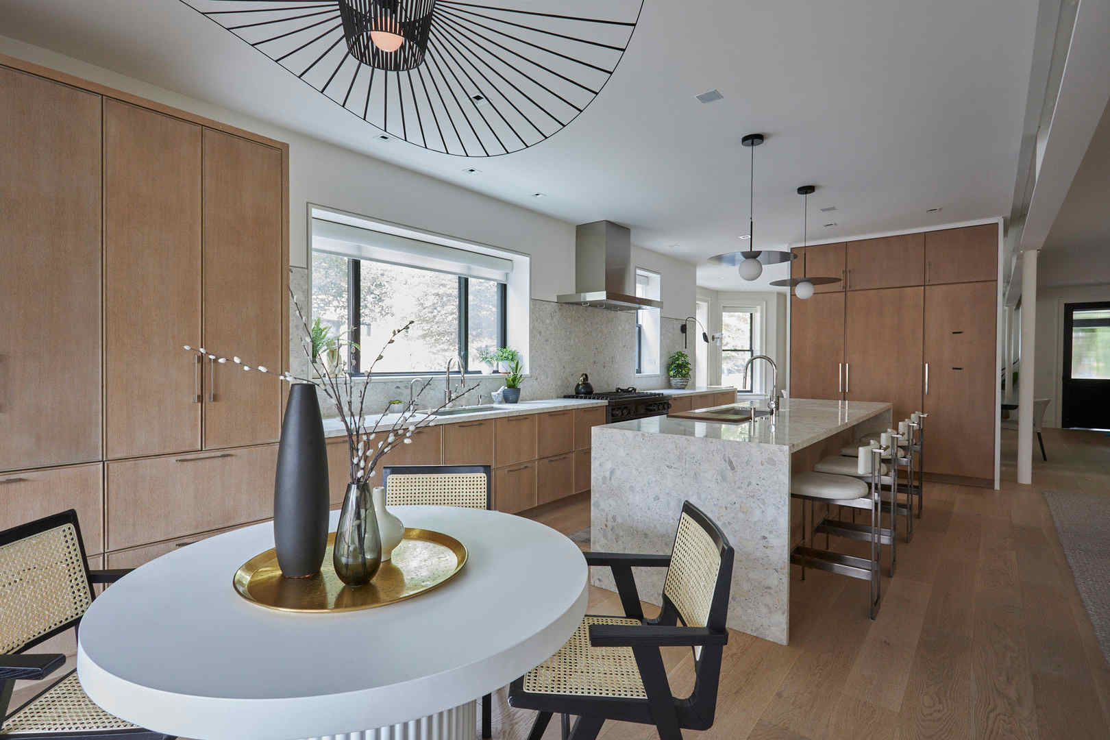 2039 North Humboldt Boulevard Chicago, IL 60647 - Photo 17 of 49 a dining room with furniture a window and kitchen view