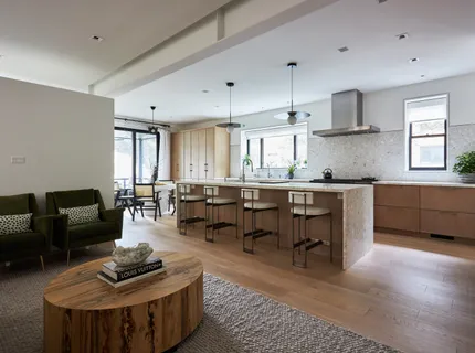 a living room with furniture and windows