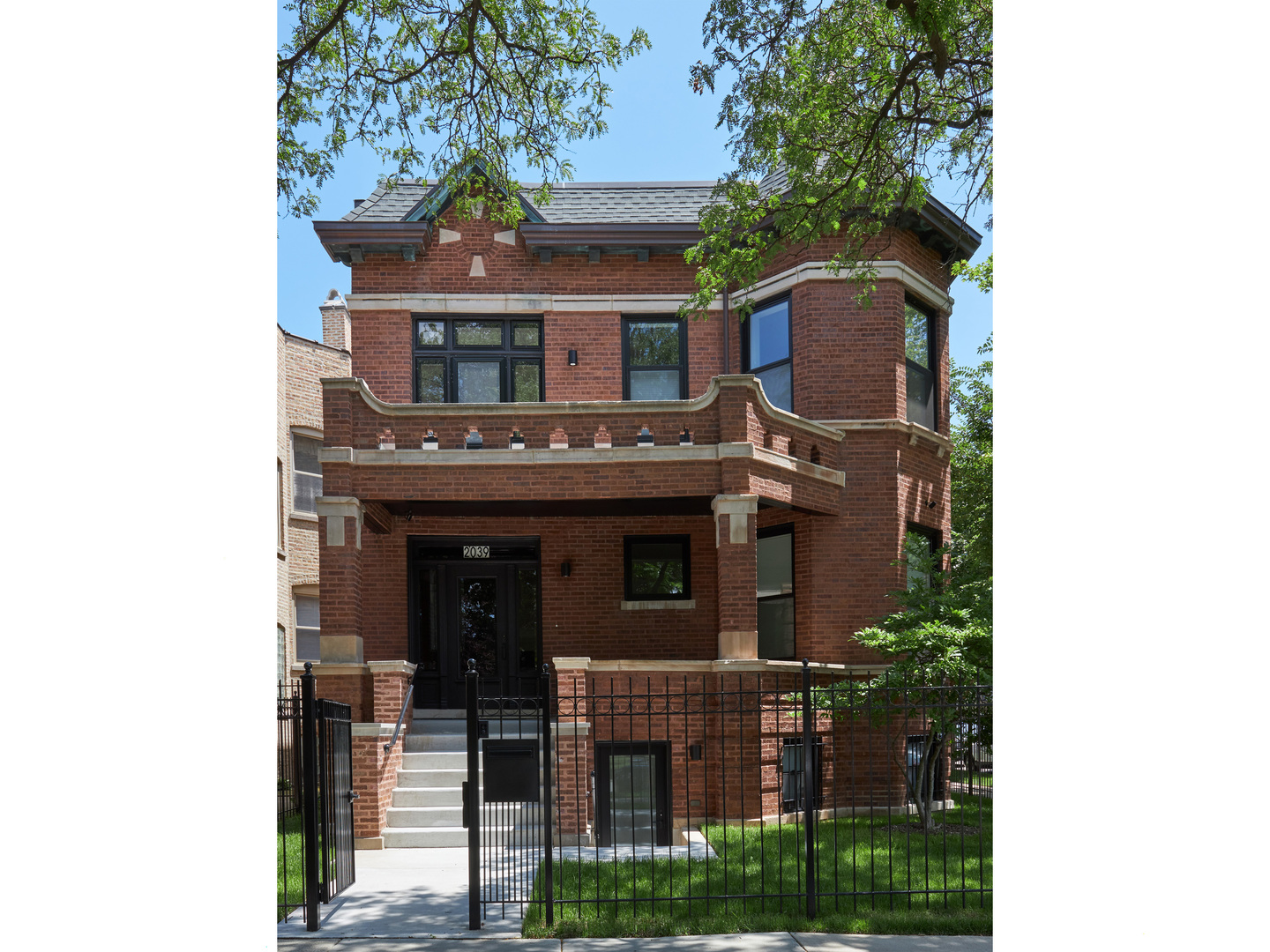 2039 North Humboldt Boulevard Chicago, IL 60647 - Photo 2 of 49 a view of house with tree s