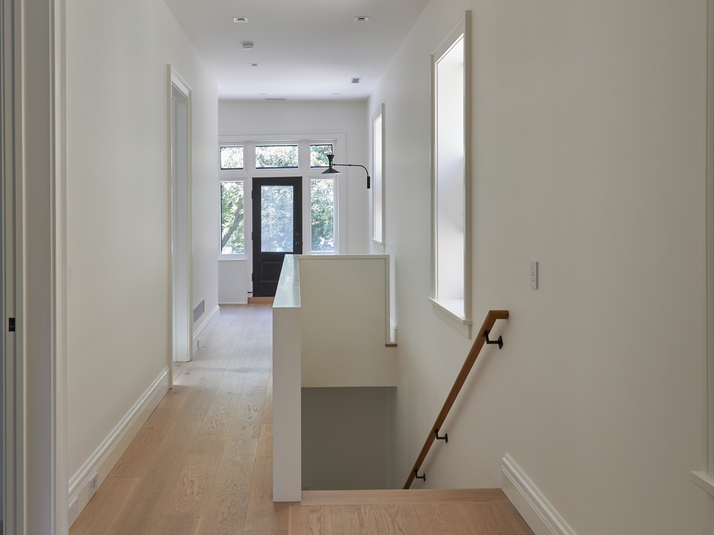 2039 North Humboldt Boulevard Chicago, IL 60647 - Photo 23 of 49 a view of hallway with furniture and a window