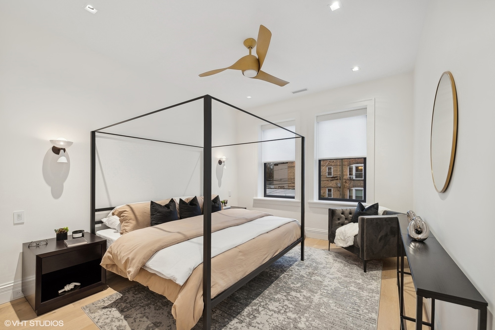 2039 North Humboldt Boulevard Chicago, IL 60647 - Photo 25 of 49 a bedroom with a bed a couch and dresser