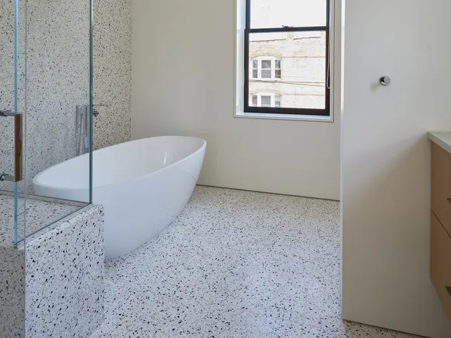 a view of closet area with empty racks