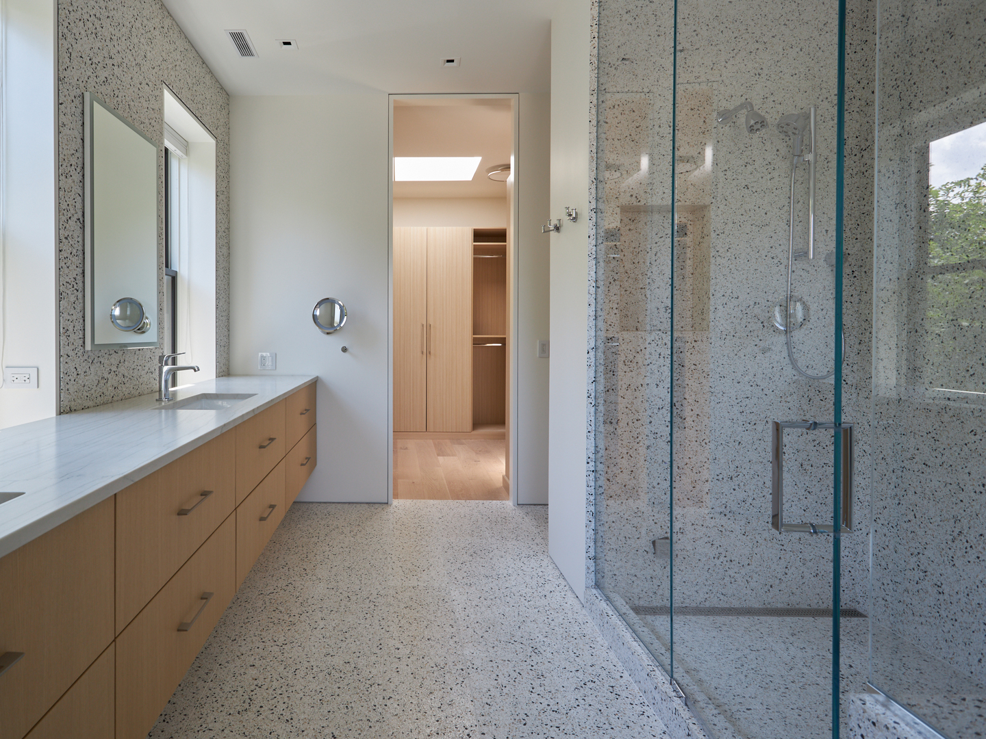 2039 North Humboldt Boulevard Chicago, IL 60647 - Photo 29 of 49 a bathroom with a double vanity sink a shower and a mirror